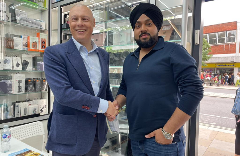 Jonathan Hulley meeting a shop keeper in Twickenham 