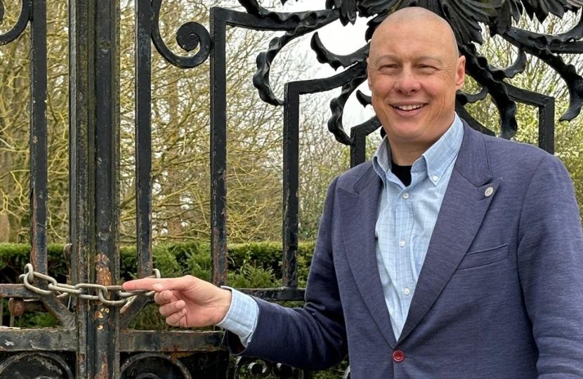 Jonathan Hulley, by locked entrance gate to the gardens