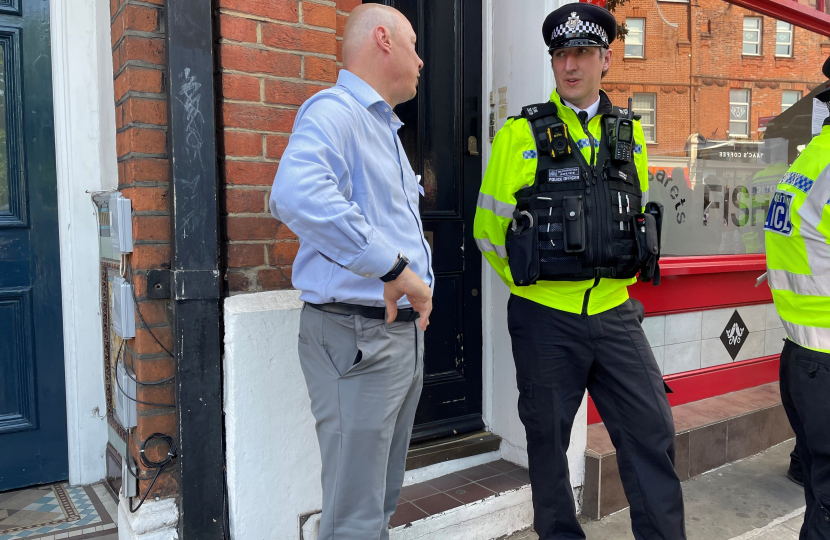 Jonathan discussing the campaign with a police officer