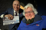 Jonathan Hulley and Elizabeth Foster out delivering InTouch Leaflets in Teddington