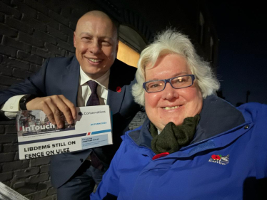 Jonathan Hulley and Elizabeth Foster out delivering InTouch Leaflets in Teddington